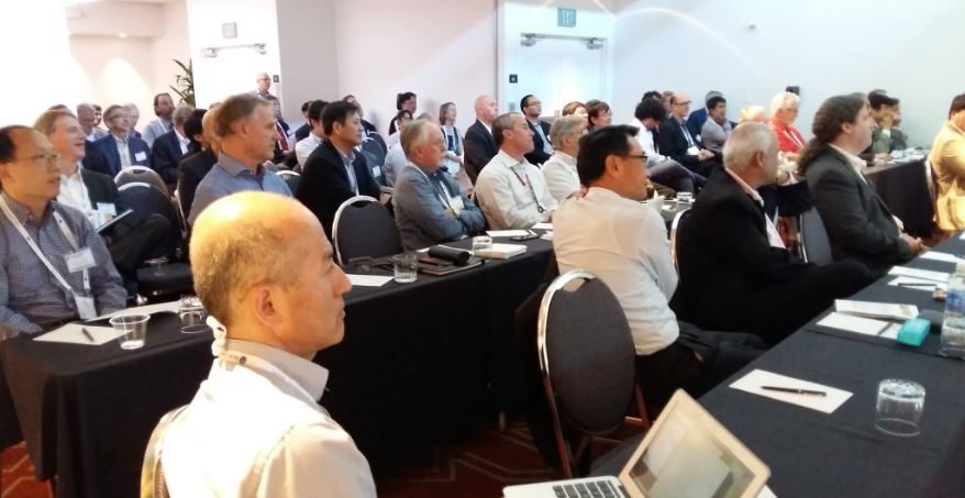 Dinner conf lots people from side